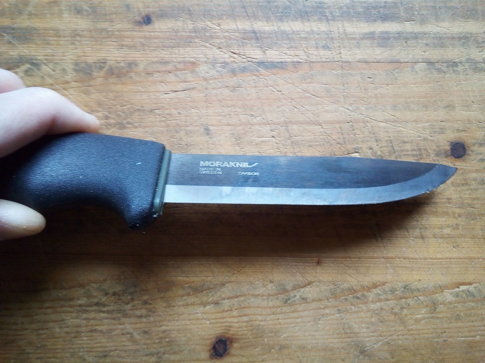 Morakniv BUSHCRAFT Black is a 3/4 rat tail tang knife The hefty blade is and stays sharp up to the tip for a long time. I carved stakes with it, cut paracord and after a two day trip the blade still was as sharp as on the day I got it. 